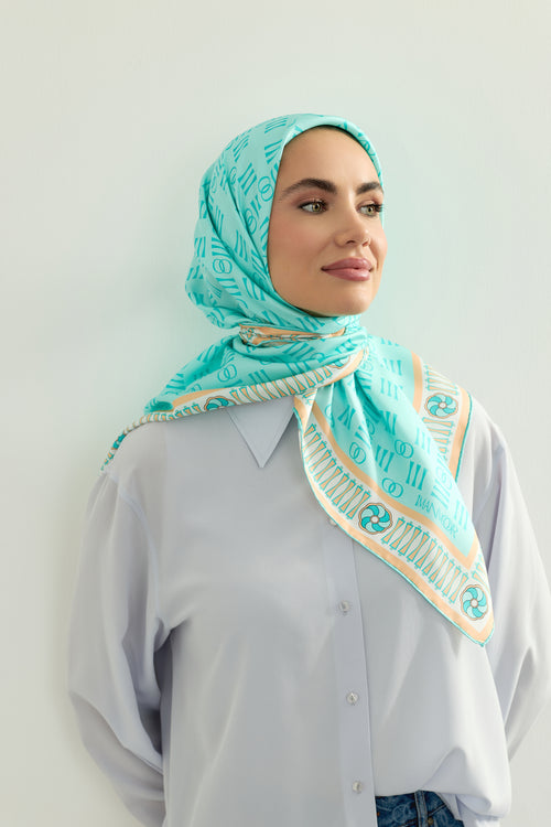 Noor Kare Turkuaz Monogram Baskı Tivil İpek Eşarp 90x90